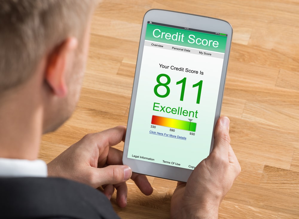Man holding credit score on app on phone