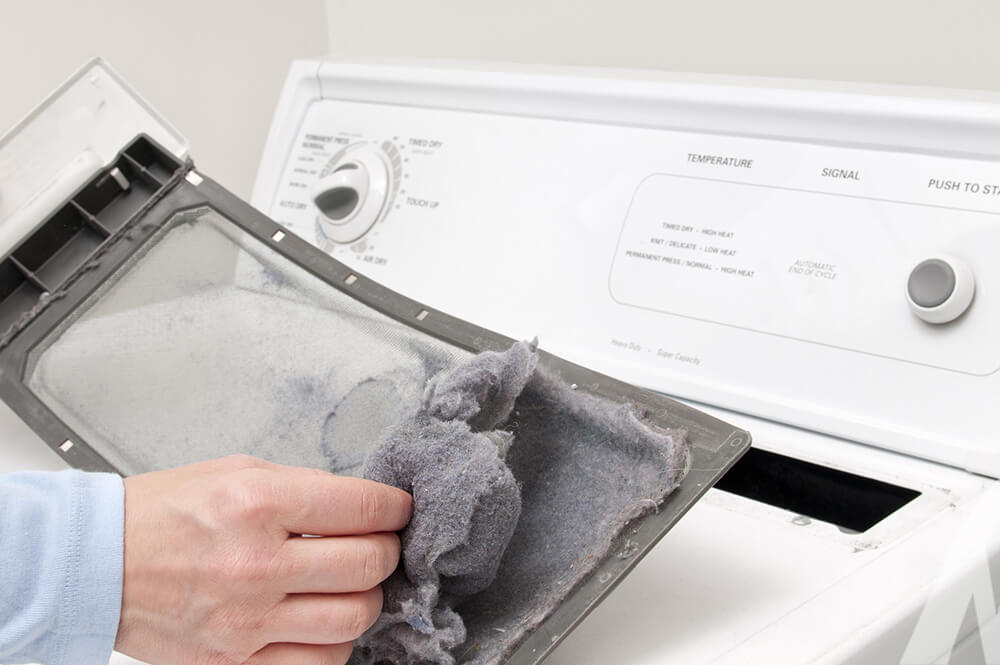 Taking lint out of dryver filter
