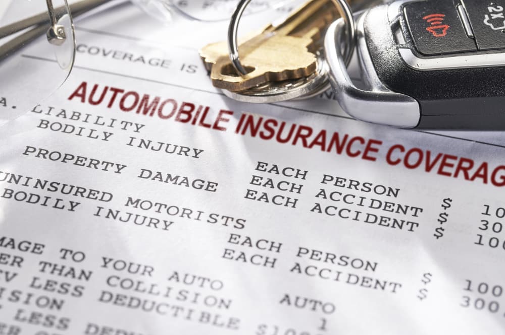 A close-up of a commercial auto insurance policy