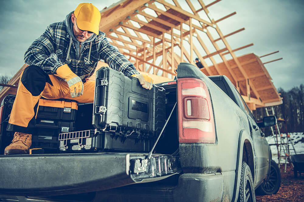 NJ contractor with toolbox in pickup truck bed for commercial auto insurance