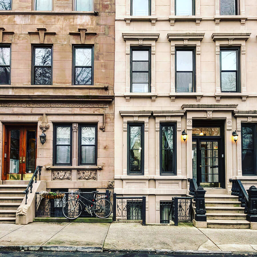 Front steps of brownstone homes in Jersey City, NJ