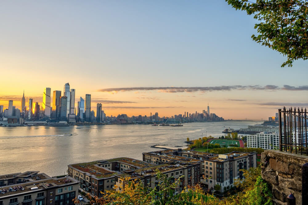 Waterfront homes along the Weehawken NJ skyline on the Hudson River
